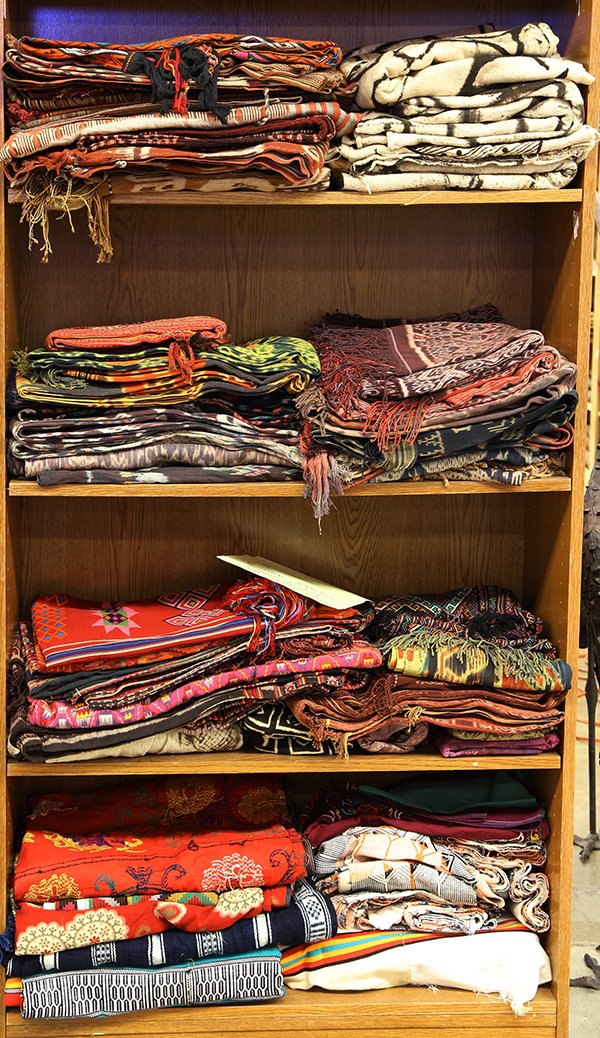 Associated group of textiles: (lot of 70) Associated group of textiles, including some South East Asian examples, including ikat and batik examples. Provenance: From the estate of Edward Gerber