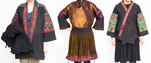 Southeast Asian hand-stitched traditional garments: (lot of 3) Southeast Asian hand-stitched traditional garments consisting of embroidered silk and canvas jackets paired with pleated skirts. Provenance: From the estate of Edward Gerber