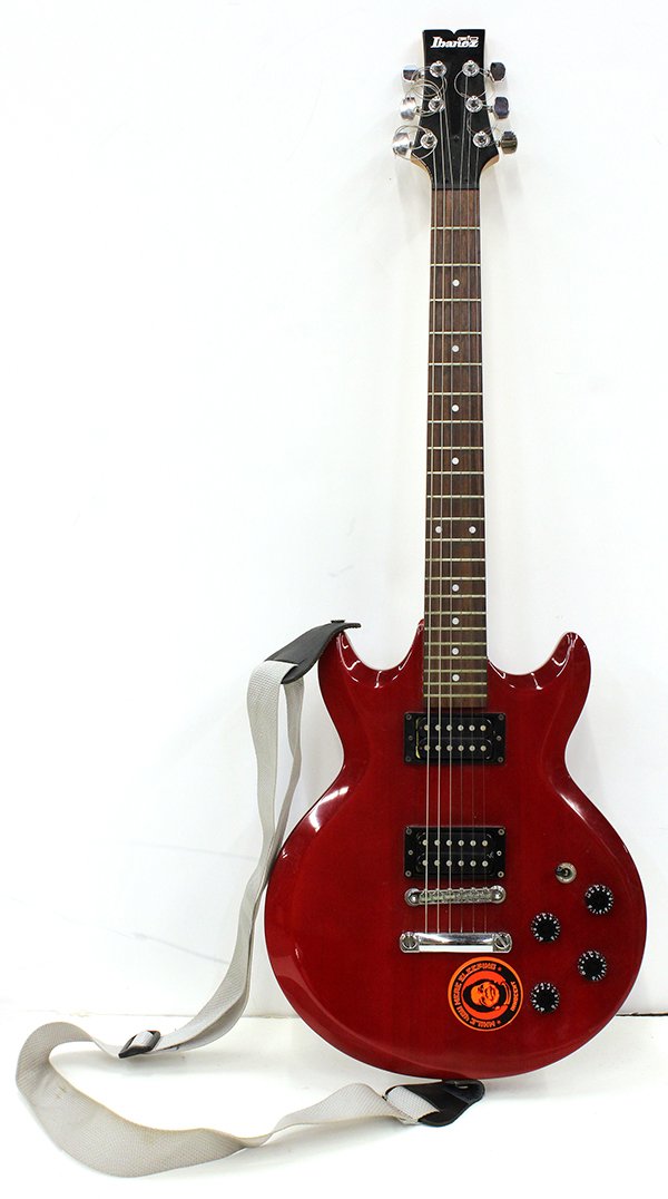 Ibanez GAX 70 electric guitar: Ibanez GAX 70 electric guitar, having a solid body in a red finish, with a hard case, 38"l