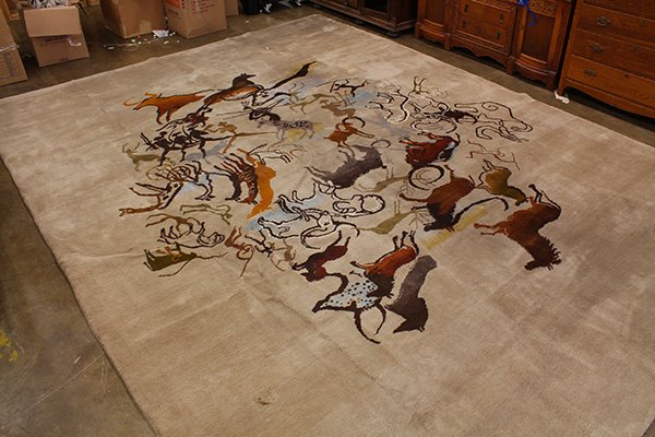 Modernist carpet, executed in taupe wool with green and: Modernist carpet, executed in taupe wool with green and brown figures, 15'4" x 11'10". Provenance: From the estate of Edward Gerber