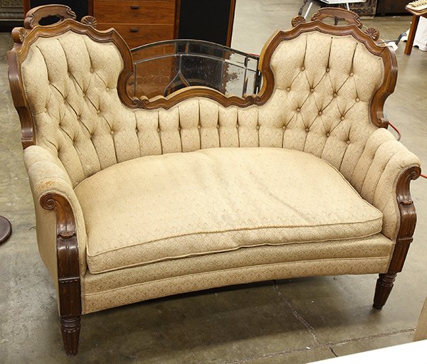 American Victorian settee: American Victorian settee, executed in the Renaissance Revival taste, circa 1870, executed in walnut, the carved crests surmounting the tufted back and risting on turned legs, 39"h x 54"w x 21"d