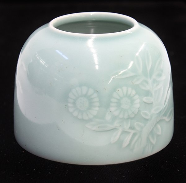 Chinese Celadon Brush Washer: Chinese celadon glazed porcelain brush washer, decorated with molded flowers and butterflies, the base with apocryphal Yongzheng mark, 2.5"h