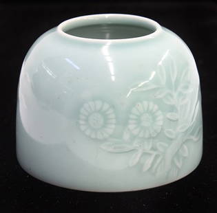 Chinese Celadon Brush Washer: Chinese celadon glazed porcelain brush washer, decorated with molded flowers and butterflies, the base with apocryphal Yongzheng mark, 2.5"h