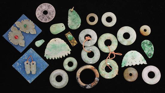 Group of Chinese Jade/Hardstone Carvings: (lot of approximately 25) Chinese jade/hardstone jewelry/accessories, consisting of a jasper ring of mottled dark and light hue; bi disks of various sizes; jadeite applique plaques, largest: 1.5"w