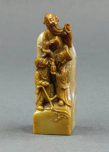 Chinese Tan Soapstone Seal: Chinese soaptone seal, carved with three of the Eight Daoist Immortals on carmel colored matrix, the back of light tan hue with red inclusions, 4.75"h