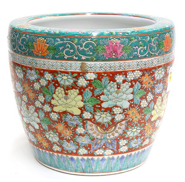 Japanese Glazed Ceramic Hibachi, Butterflies / Flowers.: Japanese glazed ceramic hibachi, decorated with various flowers and large butterflies, white interior, 10"h x10.5"dia. Provenance: From the estate of Edward Gerber