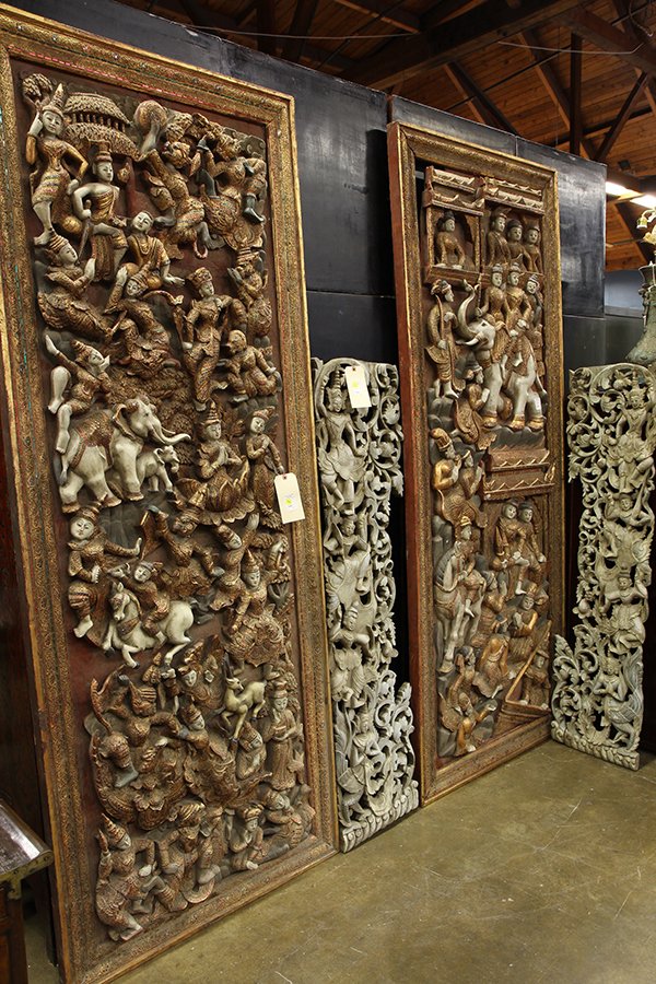 Four Thai Wood Panels: (lot of 4) Thai wood panels, consisting of two carved and reticulated panels with figures amid scrolling tendrils; together with a pair featuring Buddhist scenes sculpted in high relief, decorated wit