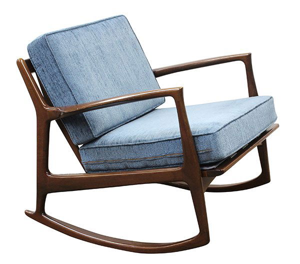 Danish Modern rocker for Selig: Danish Modern rocker for Selig, Denmark, circa 1955, attributed to IB Kofod-Larsen (1921-2003), executed in sculpted birch, having a low slatted back flowing into the flared and rounded arms and leadi