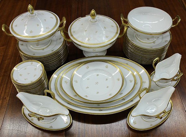 (lot of 54) Rosenthal china serving pieces: (lot of 78) Rosenthal porcelain table service, the gilt border encircling a cream ground with floral accents, comprising (26) dinner plates, 10" dia, (28) bread and butter plates, (9) pasta bowls, (3)