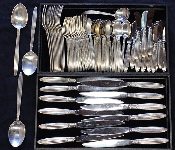 (lot of 77) Reed and Barton sterling flatware service: (lot of 77) Reed and Barton sterling flatware service for twelve plus extras in the "Jubilee" pattern 1936, comprising; twenty two teaspoons; fifteen salad forks; twleve dinner knives, dinner forks, s