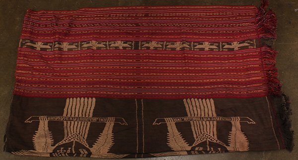 (lot of approx 39) Three shelves of textiles form: (lot of approx 39) Three shelves of textiles form Indonesia and Timor, mostly woven cotton with stripes and ikat patterns, average size; 100"l x 36"w; Provenance: From the estate of Edward Gerber