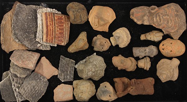 Pre-Columbian head fragments, Mexico: (lot of approx 30) Pre-Columbian head fragments, Mexico; together with vessel fragments mostly of corrugated anasazi