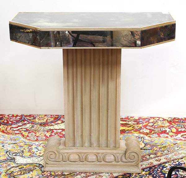 Hollywood Regency mirrored table: Hollywood Regency mirrored table, the geometric surface mounted with mottled glass, and raised on a shaped support, 30.5"h x 31"l x 15"d