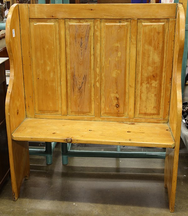 Primitive hall settle: Primitive hall settle, having a panelled back continuing to the plank seat, and rising on scroll carved legs, having a later affixed coat hook on post, overall 69"h x 40"w x 13"d, settle height 47"h