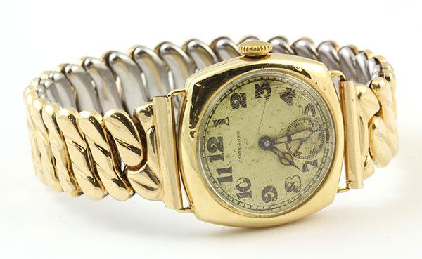 Longines 18k yellow gold wristwatch, Circa 1925: Longines 18k yellow gold wristwatch, Circa 1925 having a silvered dial with Arabic numerals, large hour and minute hands, manual wind jeweled movement by Longines #4493015 within an 18k yellow gold cu