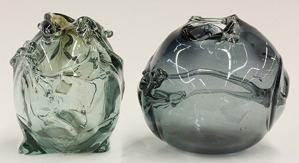 Modernist studio glass sculptures by Robert Fritz: (lot of 2) Modernist studio glass sculptures by Robert Fritz (American, 1920-1986), executed in clear and smoked glass, of spherical form with internal 'tendons', signed 'Fritz', largest, 7"h x 7"w x