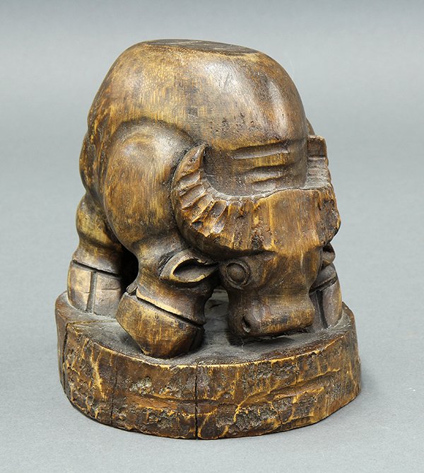 Chinese Carved Bamboo Ox: Chinese bamboo ox, in stance on all fours with head lowered, raised on an plinth, 6.25"h. Provenance: From the estate of Edward Gerber