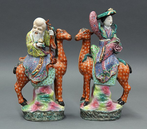 Chinese Porcelain Shoulao/Magu: (lot of 2) Chinese enameled porcelain figures, featuring Shoulao and Magu each mounted on a spotted deer, the base marked, one reads 'Huang [ ] Shun zao', with wood stands, porcelain: 13"h