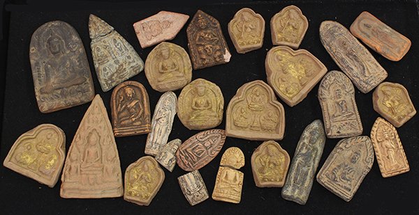 Himalayan Ceramic Tsa Tsa: (lot of 26) Himalayan ceramic tsa tsa, of various forms molded with Buddhist figures, largest: 3.5"h. Provenance: From the estate of Edward Gerber