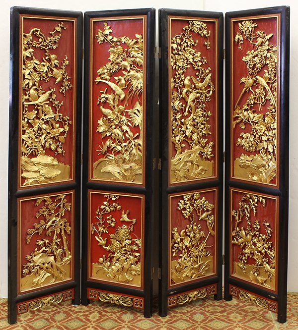 Chinese Gilt Lacquer Screen, Bird/Flower: Chinese four panel gilt lacquered wood screen, high relief carved with birds and flowers of the four seasons, heightened in gilt on a red lacquered ground, each panel approx: 72"h x 17.75"w. Provenanc