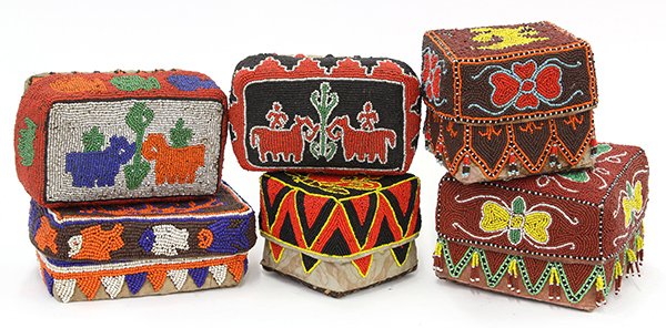 Yoruba style, Nigeria woven and beaded boxes: (lot of 6) West African woven and beaded lidded boxes having floral and zoomorphic motifs, largest: 4.5"h x 6"sq. Provenance: From the estate of Edward Gerber