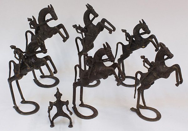 West African decorative brass sculptures: (lot of 6) West African decorative brass sculptures depicting rearing horses, largest: 13"h. Provenance: From the estate of Edward Gerber