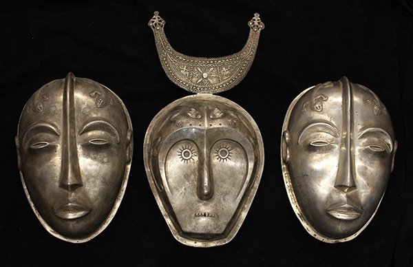 Toradya people style, Indonesia, decorative masks: (lot of 3) Toradya people style, Indonesia, decorative masks, each having lizard decorations, and stylized facial features, largest: 9"h. Provenance: From the estate of Edward Gerber