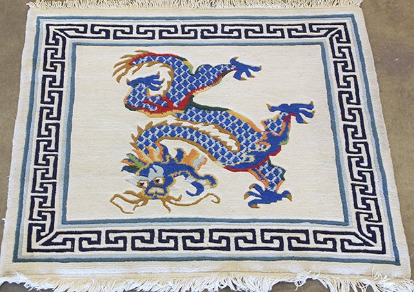 Chinese carpet with dragon: Chinese carpet with dragon, 3' x 3'2". Provenance: From the estate of Edward Gerber