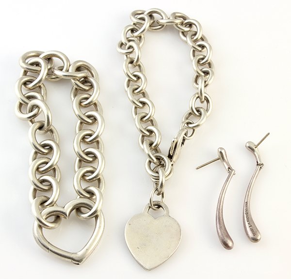 (Lot of 3) Tiffany sterling silver jewelry items: (Lot of 3) Tiffany sterling silver jewelry items comprised of one pair of Elsa Peretti dangle earrings, stamped Tiffany & Co. Peretti copyright 925 Spain (missing backs); one heart link chain bracelet