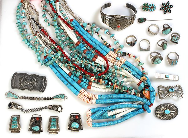 Large collection of Native American jewelry: Large collection of Native American jewelry comprised of eight turquoise and silver rings; four gem and silver watch bracelets; one coral and silver bangle bracelet; nine turquoise and gem bead neckla