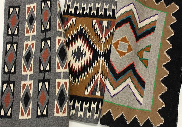 (lot of 3) Native American rugs, 2nd half 20th century,: (lot of 3) Native American rugs, 2nd half 20th century, consisting of two Teec Nos Pos examples; together with another rug having geometric elements on a grey ground, largest: 29"h x 30"w