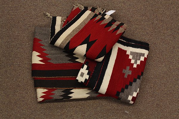 (lot of 3) Native American Ganado (Navajo) blankets: (lot of 3) Native American Ganado (Navajo) blankets, including one in red and black on a cream ground, with natural dyes, one eye dazzler, and one having a six pointed star pattern, largest: 63" x 34"