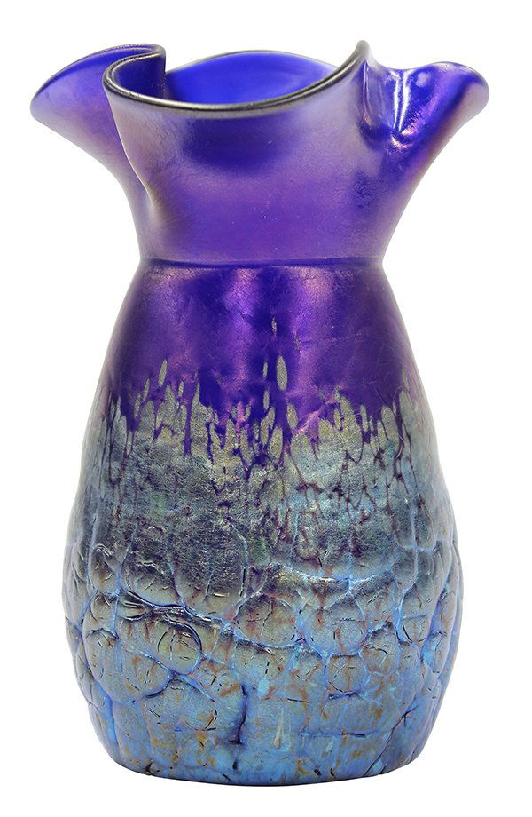 Loetz art glass Lava vase circa 1900: Loetz art glass Lava vase circa 1900, having a flared rim in blue aurene, above the body with an iridescent surface continuing to the mottled base, marked "Loetz, Austria", 5.5"h