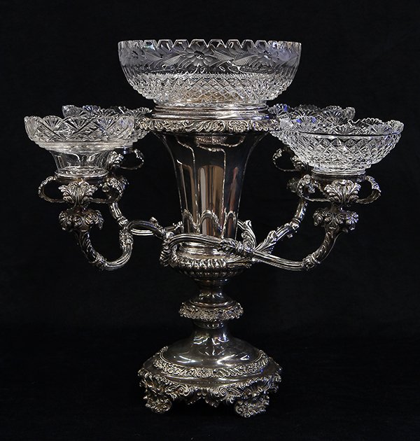 Silverplate epergne in the Georgian taste: Silverplate epergne in the Georgian taste, having an etched crystal bowl surmounting the urn form standard with gadrooned rim, four sinuous arms with acanthus decoration support smaller bowls, the who