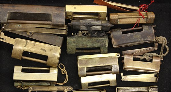Group of Chinese Locks and Keys: (lot of 11) Group of Chinese locks with keys, of various sizes and styles largest: 5.5"w, Provenance: From the estate of Edward Gerber
