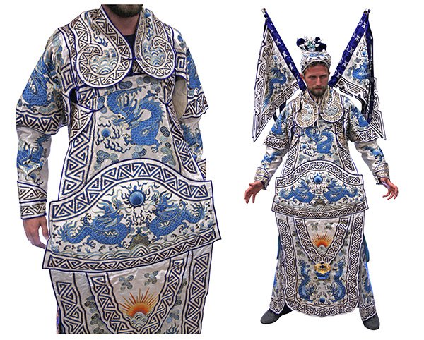 Chinese Theatrical Robe: Chinese silk theatrical robe, embroidered with dragons heightened in gilt couching on a white ground, consisting of the robe, a separate collar, apron, a headdress and four flags, robe approx: 57.5"h.