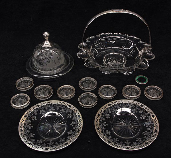 (lot of 12) Dutch silver mounted crystal: (lot of 12) Dutch silver mounted crystal, consisting of a shaped basket, covered butter, eight coasters; together with floral etched plates with pierced scrolling silver border