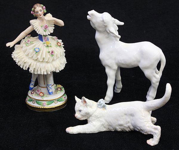 (lot of 3) Meissen porcelain figural group, consisting: (lot of 3) Meissen porcelain figural group, consisting of a Meissen model of a playful white cat wearing a blue ribbon, with underglaze blue crossed swords mark, 3.5"h x 6"l; a Meissen model of a bray