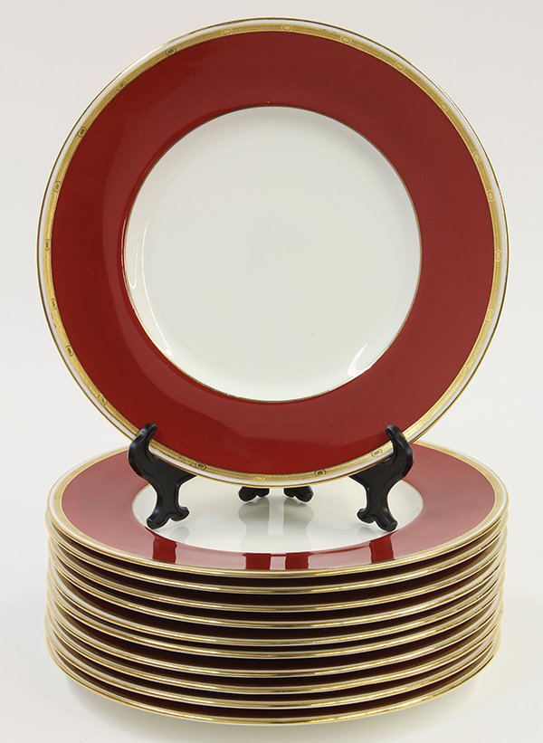 (lot of 12) Mintons porcelain service plates, each: (lot of 12) Mintons porcelain service plates, each having gilt rim surrounding a red border, 10"dia.