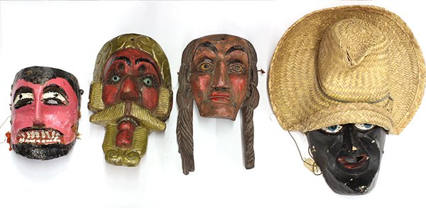 (lot of 4) One shelf of Mexican carnival masks: (lot of 4) One shelf of Mexican carnival masks, consisiting of a Danza de los Tlacolocleros (dance of the fieldhands) executed in carved wood, painted black with blue eyes and wearing a straw hat (pos