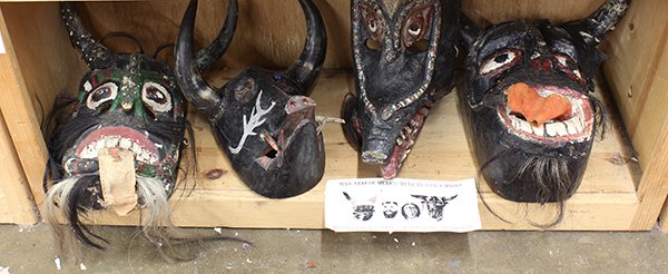 (lot of 4) Mexican dance masks, represting the devil,: (lot of 4) Mexican dance masks, represting the devil, each having cow horns, three with horestail beards, largest: 15"l. Provenance: From the estate of Edward Gerber
