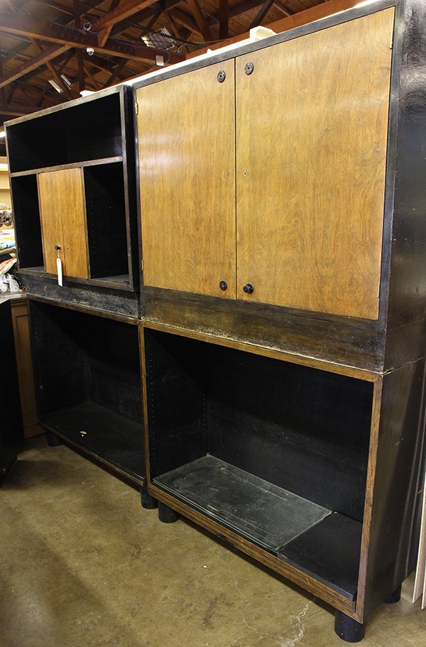 (lot of 5) Mid-Century Modern cabinets by New Zeland: (lot of 5) Mid-Century Modern cabinets by New Zeland designer Joseph 'Jo' Sinel, one of the first industrial designers, executed with ebonized wood shelves and natural wood doors, with wood and metal 