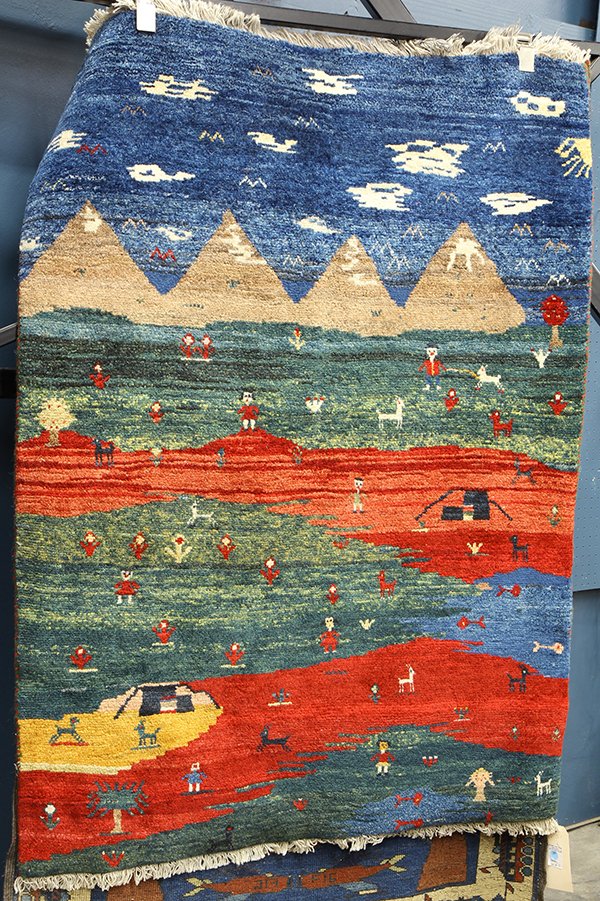 (lot of 2) Modernist Nepalese pictoral carpets: (lot of 2) Modernist Nepalese pictoral carpets, larger: 5'7" x 3'6". Provenance: From the estate of Edward Gerber