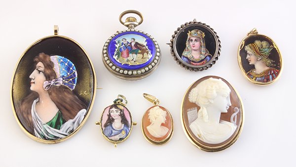 Collection of Victorian and Victorian style jewelry: Collection of Victorian and Victorian style jewelry comprised of a painted enamel, faux pearl and 800 (80%) silver pendant-watch; one shell cameo and 18k yellow gold pendant-brooch; one small shell ca