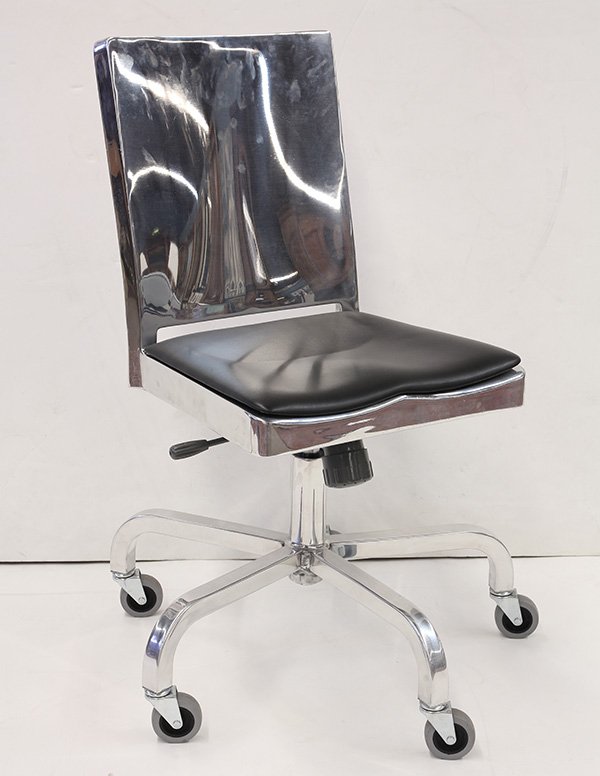 Philippe Starck for Emeco aluminum desk chair: Philippe Starck (French, 1949 - ) for Emeco aluminum desk chair, having a rectangular back above a black leather seat, and rising on a swivel base, 32.5"h