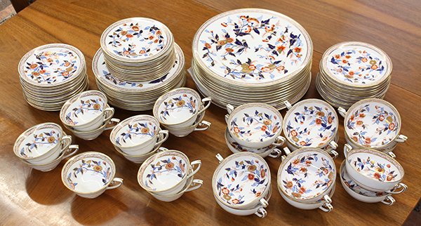 (lot of 58) Royal Worcester partial table service for: (lot of 58) Royal Worcester partial table service for twelve, having polychrome Imari floral decoration with a gilt border, consisting of (12) dinner plates, 10.75"dia., (12) bread plates, (11) lunche