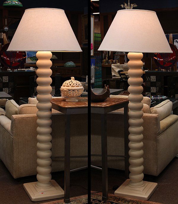 (lot of 2) John Dickinson style Moderne floor lamps: (lot of 2) John Dickinson style Moderne floor lamps, each having a large turned standard executed in white, a rising on a graduated square base, 65"h