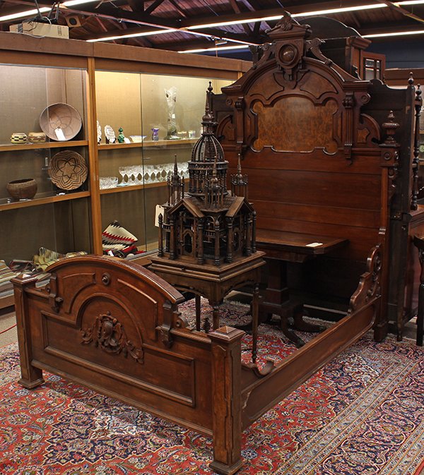 American Victorian bedroom suite: (Lot of 2) American Victorian bedroom suite, Grand Rapids, circa 1870, executed in walnut and burl, the bed having a high back with a carved architectural crest above a burl panel flanked by fluted pi
