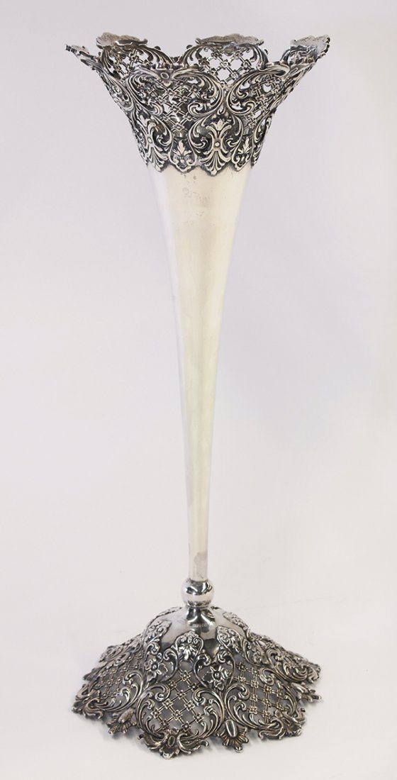 American sterling silver vase, by Redlich & Company: American sterling silver vase, by Redlich & Company, New York, NY, 1895-1946, the graceful polished trumpet form set with a flared collar and stylized bell shaped base having pierced rosette accented 