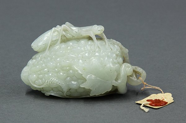 Chinese Jade Bottle, Melon/Cricket: Chinese celadon jade bottle, featuring a cricket perched on a bitter melon, executed from a celadon matrix, 3.5"w; Provenance: Estate of Carolyn T.C. Chang, Tucson, Arizona, acquired in Hong Kong in t